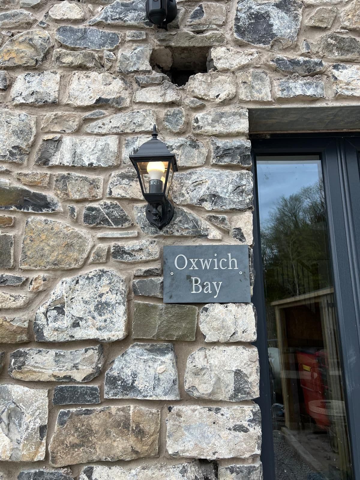 The Oxwich Bay Lodge — Our flagship lodge — private sauna, hot tub & copper bath